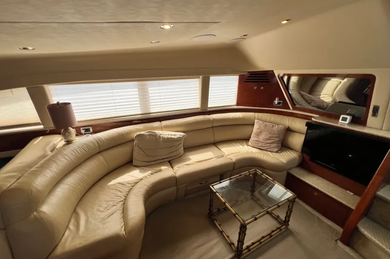 Slide: The Image of Luxurious interior of 2003 Sea Ray 480 Motor Yacht with plush seating and elegant decor. - 157