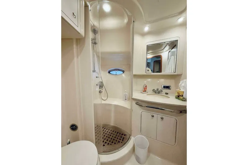Slide: The Image of Luxurious bathroom in 2003 Sea Ray 480 Motor Yacht with shower and vanity. - 13