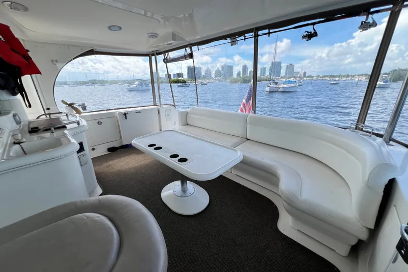 Slide: The Image of Interior of 2003 Sea Ray 480 Motor Yacht with waterfront city view. - 172