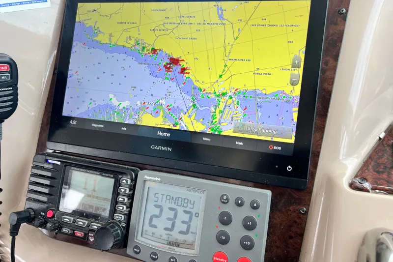 Slide: The Image of Garmin navigation system on 2003 Sea Ray 480 Motor Yacht displaying nautical chart. - 93
