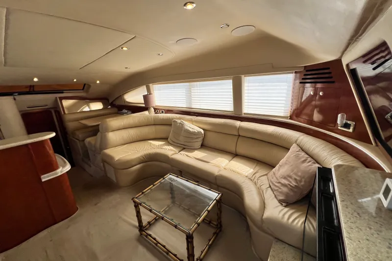 Slide: The Image of Luxurious interior of 2003 Sea Ray 480 Motor Yacht with plush seating and elegant decor. - 159