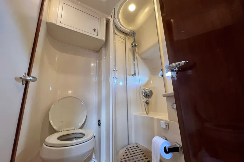 Slide: The Image of Bathroom interior of 2003 Sea Ray 480 Motor Yacht with shower and toilet. - 111