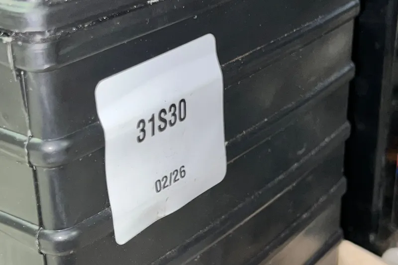 Slide: The Image of Black container labeled "31S30" with date "02/26," related to 2003 Sea Ray 480 Motor Yacht. - 47