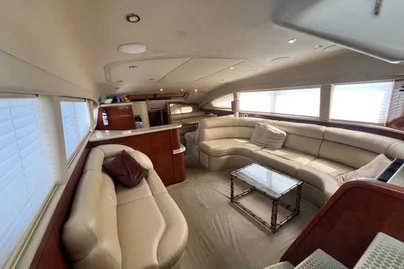 Slide: The Image of Luxurious interior of 2003 Sea Ray 480 Motor Yacht with plush seating and elegant decor. - 153