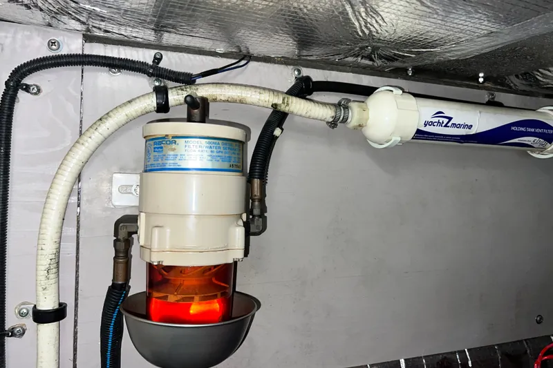 Slide: The Image of Fuel filter system in a 2003 Sea Ray 480 Motor Yacht engine room. - 50