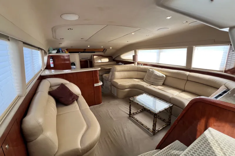 Slide: The Image of Luxurious interior of 2003 Sea Ray 480 Motor Yacht with plush seating and elegant design. - 162
