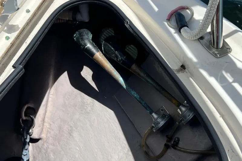 Slide: The Image of Storage compartment on a 2003 Sea Ray 480 Motor Yacht, showing anchor chain and equipment. - 67