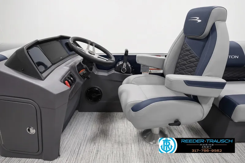 Slide: The Image of 2027 Bennington 21 SSR boat interior with steering wheel and captain's chair. - 3