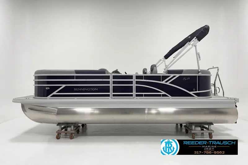 The Image of 2027 Bennington 21 SSR pontoon boat in showroom, side view with sleek design. - 1