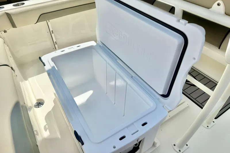 Slide: The Image of Open cooler on 2025 Key West 219 FS boat, showcasing spacious interior design. - 25