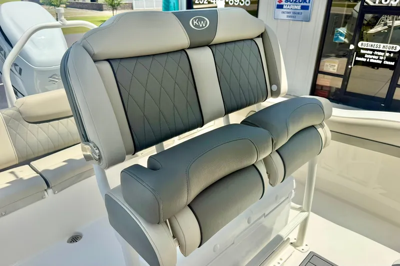 Slide: The Image of 2025 Key West 219 FS boat seat with gray and black upholstery, showcasing luxury design. - 21