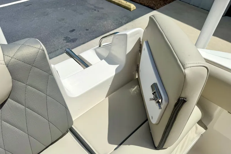 Slide: The Image of 2025 Key West 219 FS boat seat with quilted upholstery and storage compartment. - 27