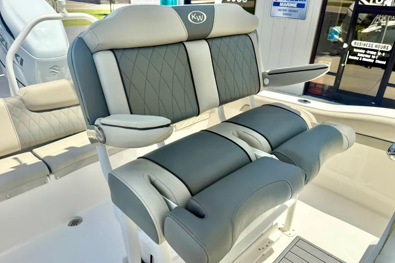 Slide: The Image of 2025 Key West 219 FS boat seating with gray and white cushioned design. - 22