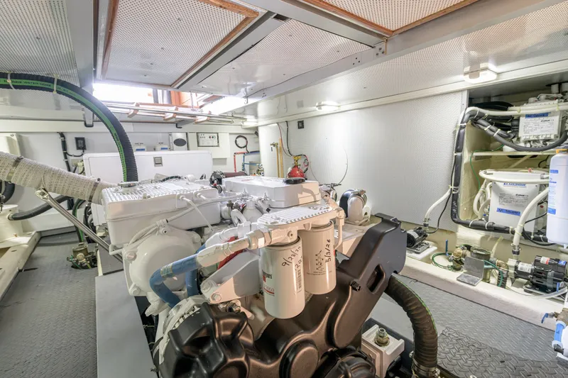 Slide: The Image of Engine room of 2017 North Pacific 49 Pilothouse yacht, showcasing machinery and equipment. - 40