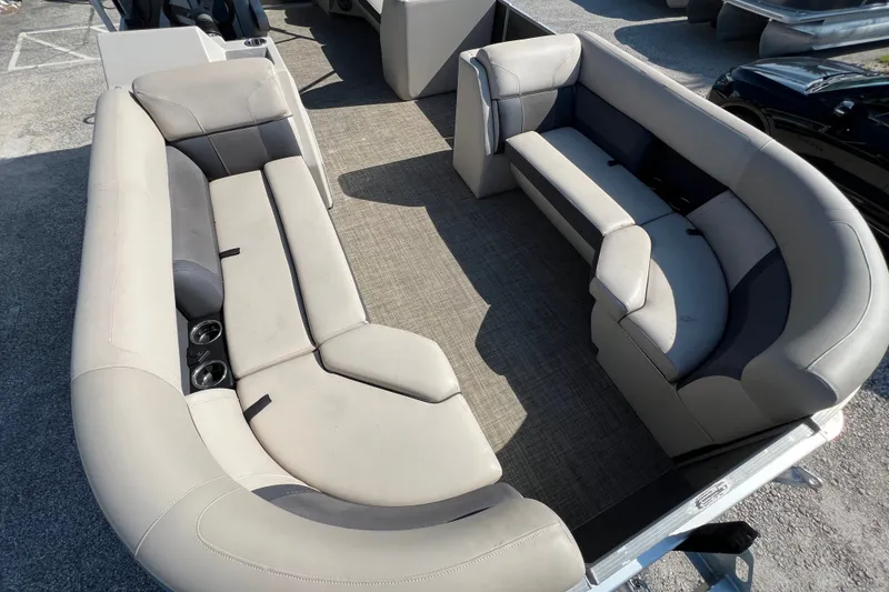 Slide: The Image of 2023 Harris Cruiser 230 boat interior with spacious seating and modern design. - 6