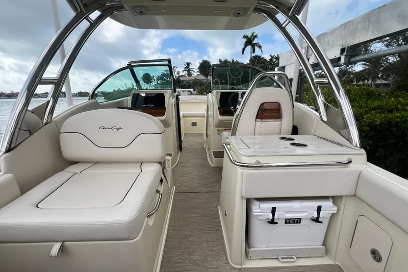 Slide: The Image of 2024 Chris-Craft Calypso 24 boat interior with elegant seating and modern design. - 11