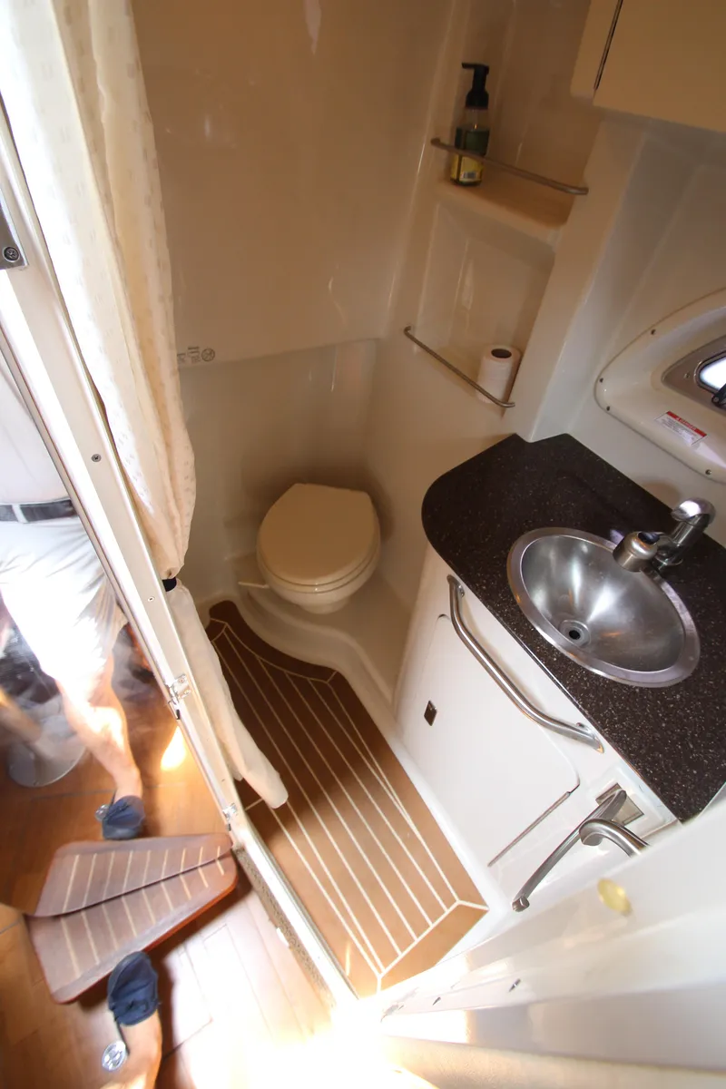 Slide: The Image of 2012 Sea Ray 330 Sundancer bathroom with sink and toilet - 44