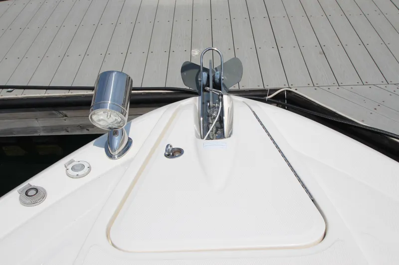 Slide: The Image of Bow of 2012 Sea Ray 330 Sundancer with anchor and spotlight. - 22