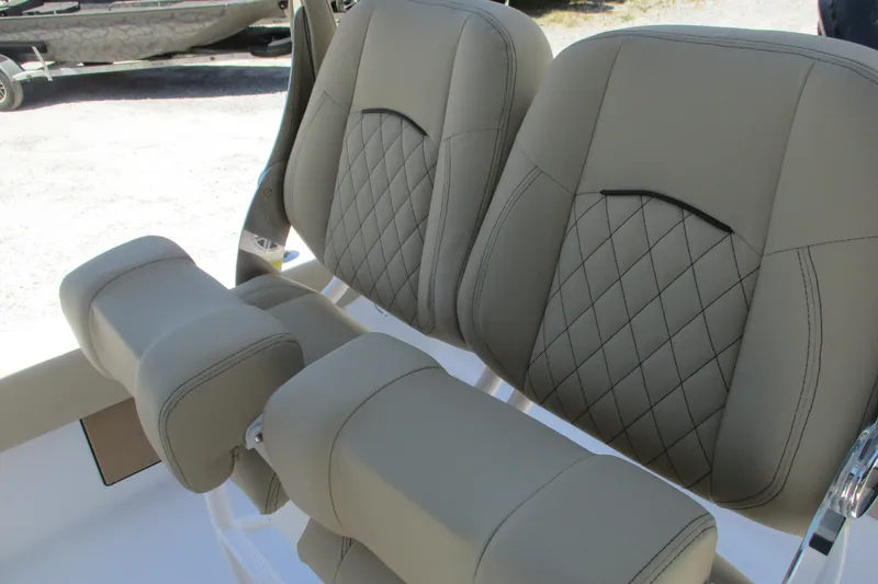 Slide: The Image of Luxurious seating on 2027 Sportsman Masters 227 Bay Boat with diamond-stitched upholstery. - 8