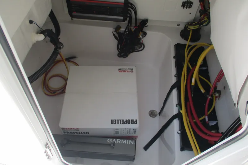 Slide: The Image of Interior view of a 2027 Sportsman Masters 227 Bay Boat with Yamaha propeller box. - 12