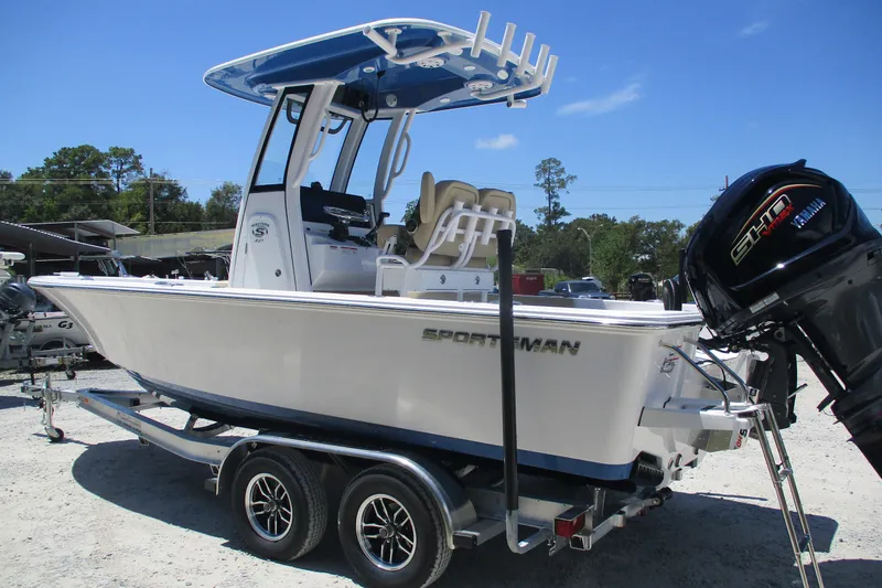 Slide: The Image of 2027 Sportsman Masters 227 Bay Boat on trailer, featuring Yamaha outboard motor. - 5