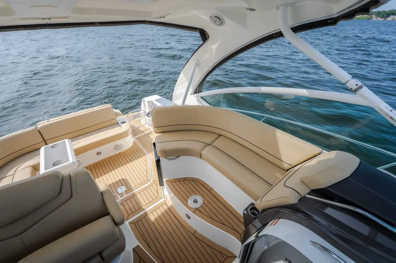Slide: The Image of Luxurious 2012 Cruisers Yachts 380 Express interior with tan seating and wood flooring. - 67