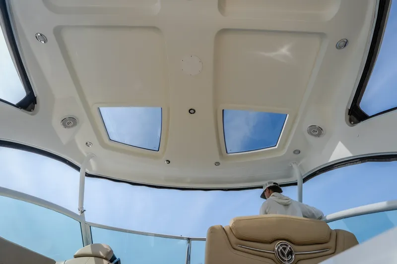 Slide: The Image of Interior view of 2012 Cruisers Yachts 380 Express with skylights and seating. - 18