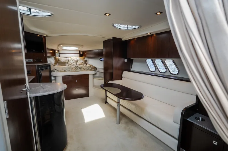 Slide: The Image of Luxurious interior of 2012 Cruisers Yachts 380 Express with elegant seating and cozy sleeping area. - 55