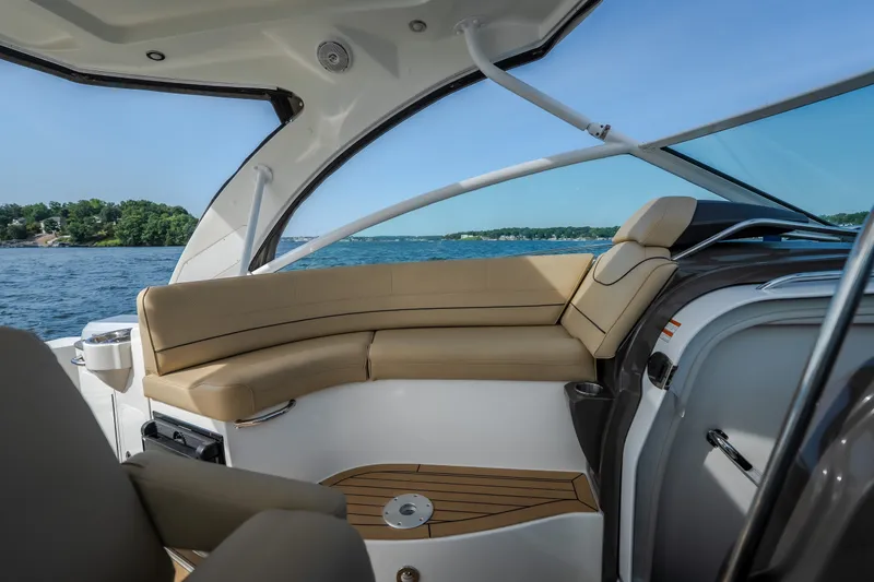 Slide: The Image of Luxurious interior of 2012 Cruisers Yachts 380 Express with beige seating and scenic water view. - 27