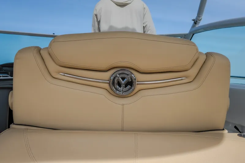 Slide: The Image of 2012 Cruisers Yachts 380 Express beige leather seat with emblem detail. - 30