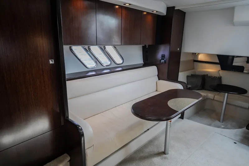 Slide: The Image of Luxurious interior of 2012 Cruisers Yachts 380 Express with elegant seating and wooden accents. - 54