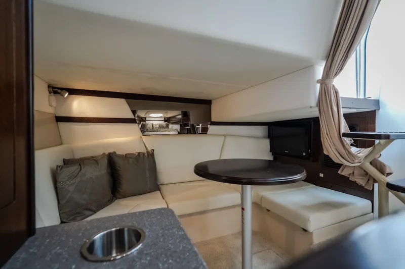Slide: The Image of Luxurious interior of 2012 Cruisers Yachts 380 Express with elegant seating and table. - 44