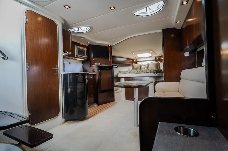 Slide: The Image of Luxurious interior of 2012 Cruisers Yachts 380 Express with modern amenities and elegant design. - 49