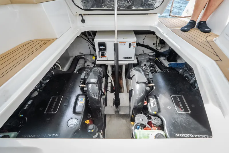 Slide: The Image of Engine compartment of 2012 Cruisers Yachts 380 Express with Volvo Penta engines and Kohler generator. - 70