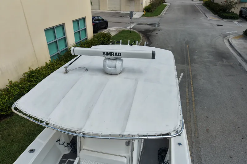Slide: The Image of Overhead view of a 1997 Venture 34 Center Console boat with Simrad radar. - 38