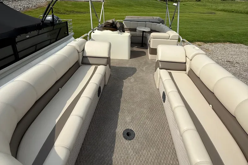 Slide: The Image of Luxurious interior of 2005 Avalon Paradise Elite 2425 pontoon boat with plush seating. - 7