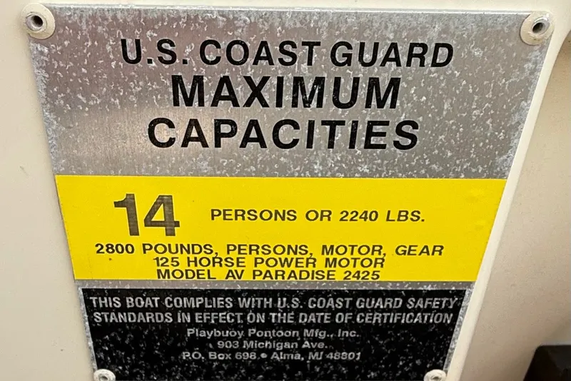 Slide: The Image of U.S. Coast Guard capacity plate for Avalon Paradise Elite 2425, 14 persons or 2240 lbs. - 11