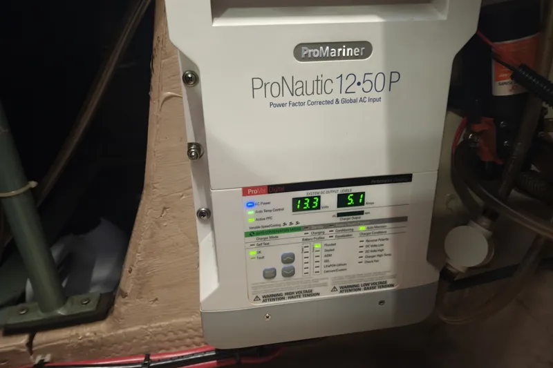 Slide: The Image of ProMariner ProNautic 12:50 P charger installed in a boat. - 32