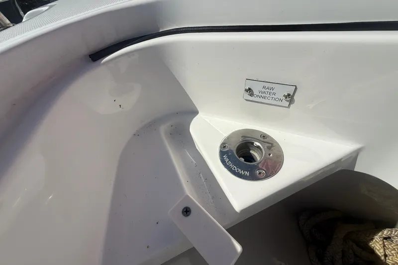 Slide: The Image of 2019 HCB 42 Siesta boat's raw water connection and washdown port detail. - 29