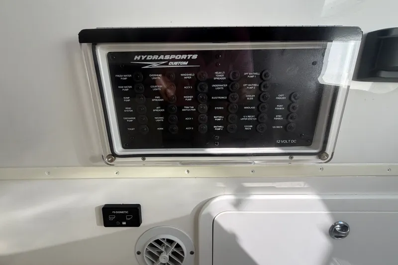 Slide: The Image of Control panel of 2019 HCB 42 Siesta boat with various switches and labels. - 35