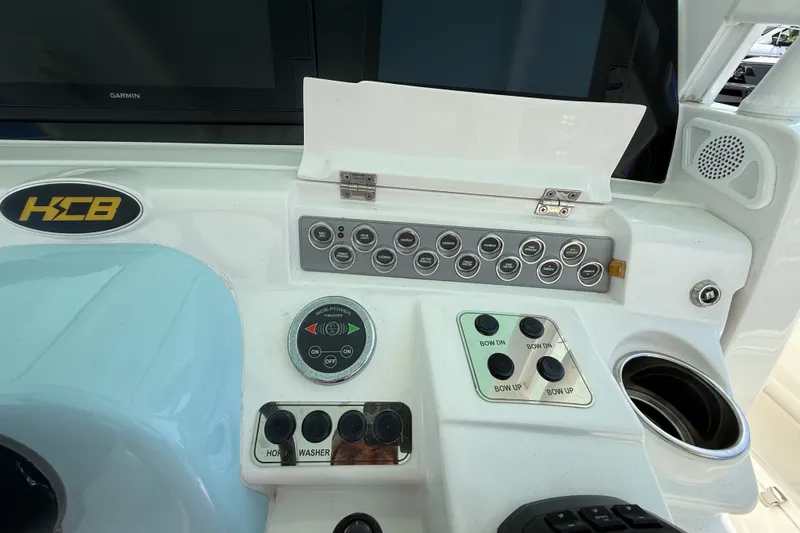 Slide: The Image of Control panel of 2019 HCB 42 Siesta boat with various switches and buttons. - 21