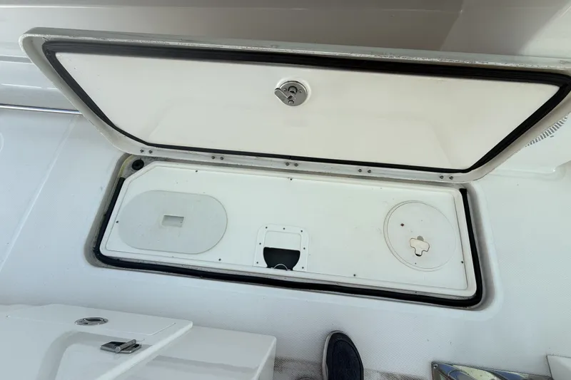 Slide: The Image of Open storage compartment on 2019 HCB 42 Siesta boat deck. - 15