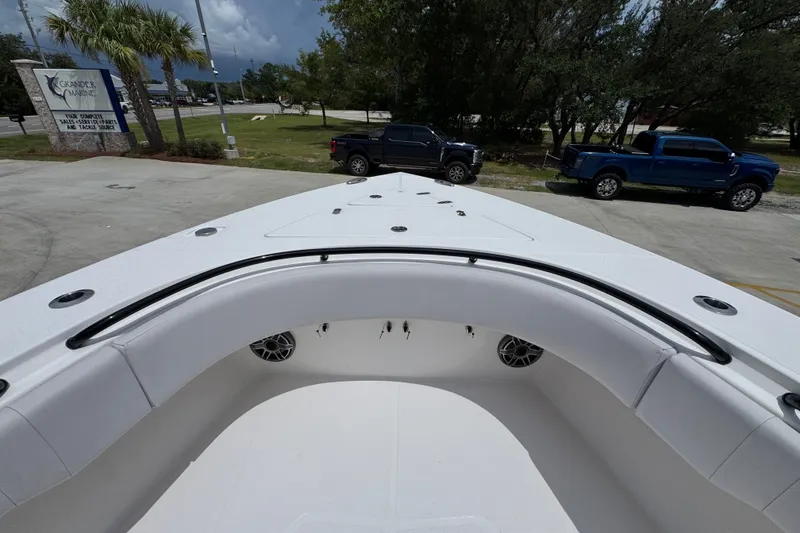 Slide: The Image of 2024 Fountain 34 Tournament Edition boat with spacious seating and sleek design. - 22