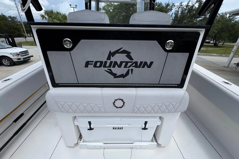 Slide: The Image of 2024 Fountain 34 Tournament Edition boat interior with logo and Yeti cooler. - 40