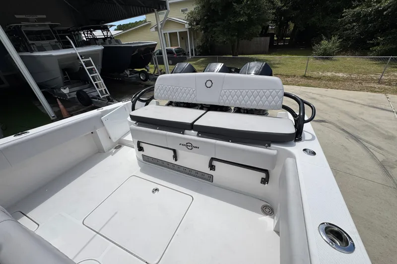 Slide: The Image of 2024 Fountain 34 Tournament Edition boat interior with seating and storage compartments. - 42