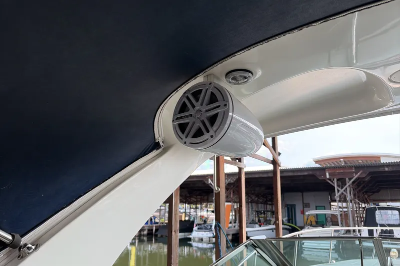 Slide: The Image of Speaker installed on a 2007 Sea Ray 290 Sundancer boat under a blue canopy. - 36