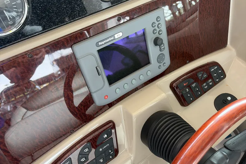 Slide: The Image of Control panel of a 2007 Sea Ray 290 Sundancer boat with Raymarine C70 display. - 19