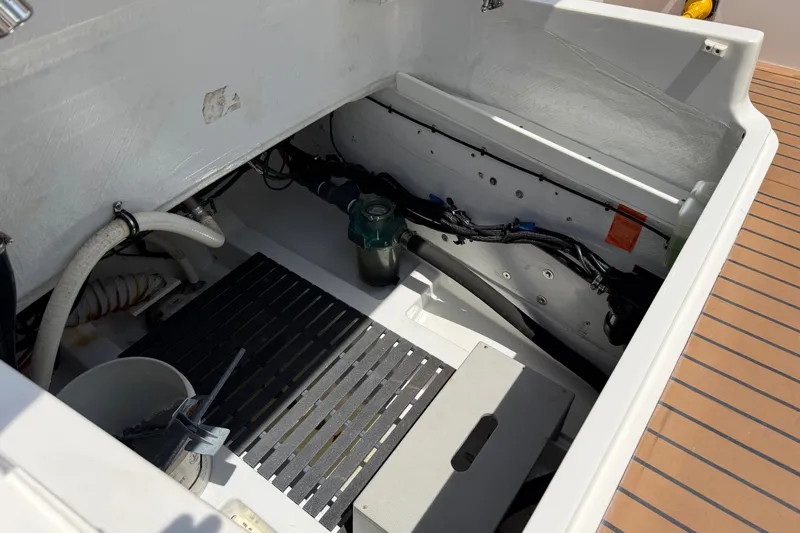 Slide: The Image of Engine compartment of 2018 MJM 35z boat, showcasing interior components and wiring. - 40