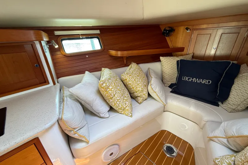 Slide: The Image of Cozy interior of 2018 MJM 35z yacht with cushions and wooden accents. - 27