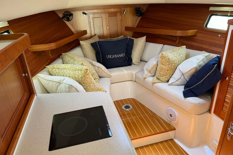 Slide: The Image of Luxurious interior of 2018 MJM 35z yacht with cozy seating and elegant wood finish. - 26